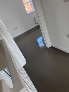 Subfloor latex preparation for LVT installation in a new build home by Koti Homes